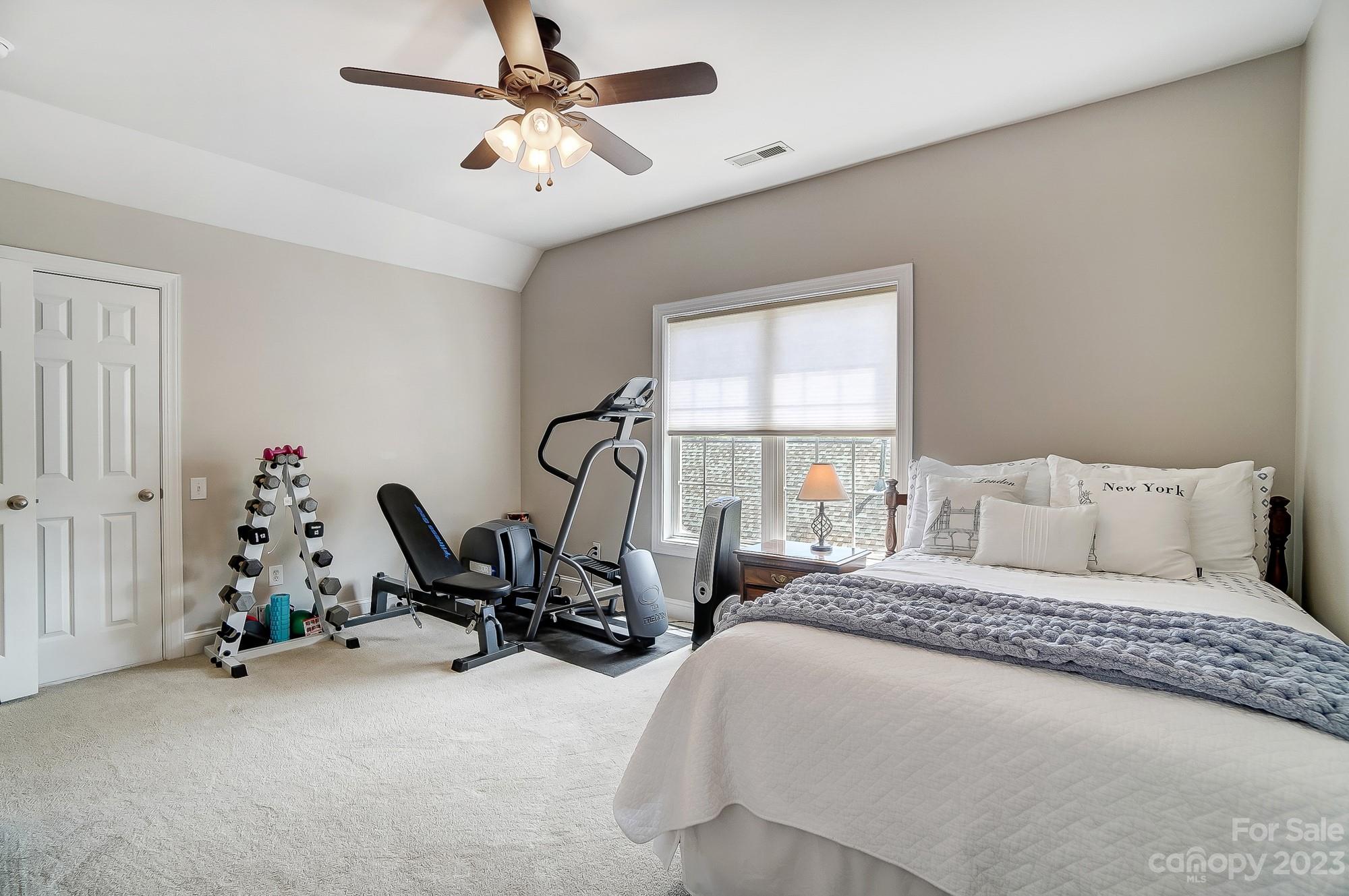 1105 Legacy Lane Fort Mill, SC 29708 - Photo 32 of 43 a bed room with bed and a chair