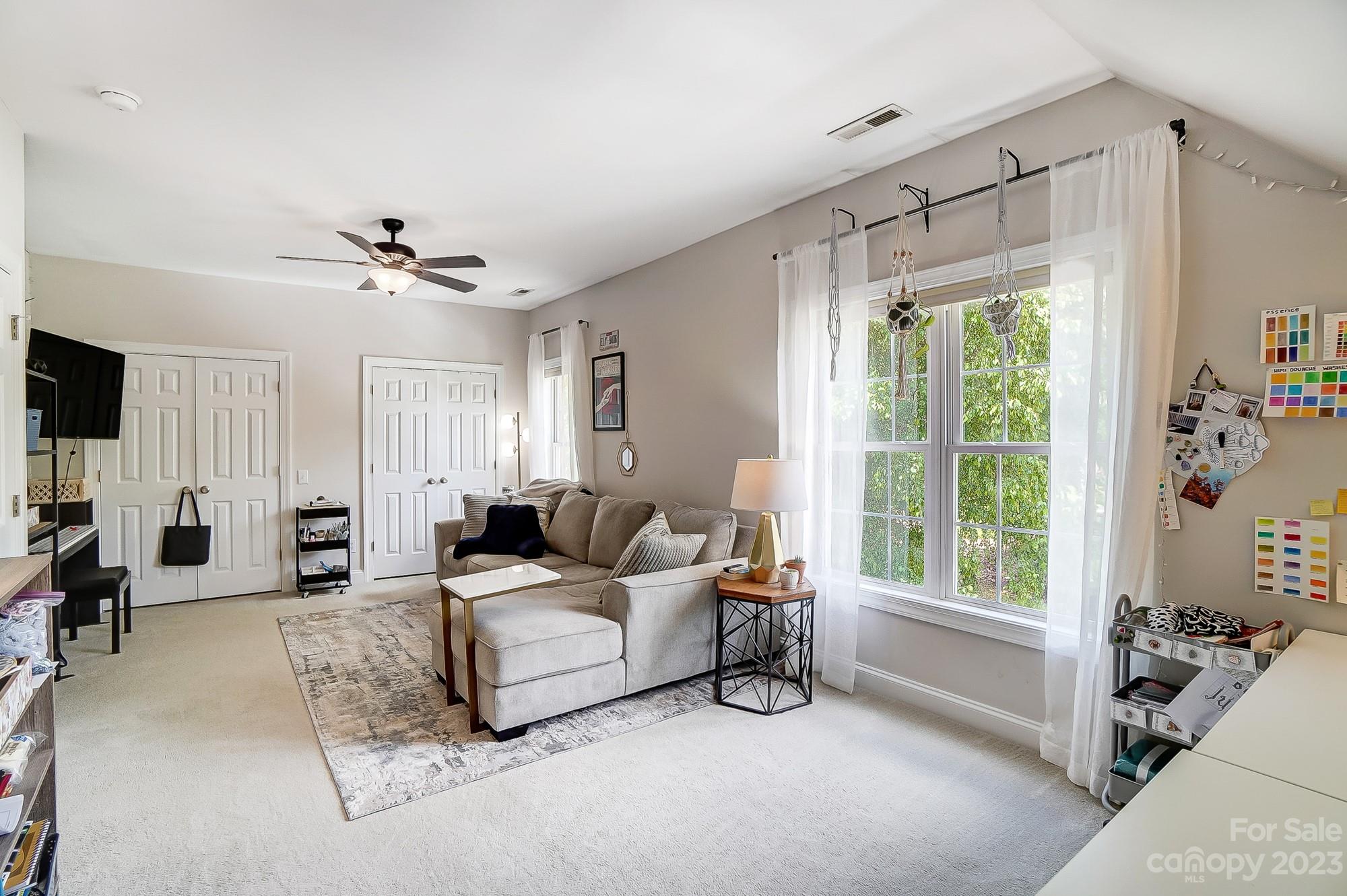 1105 Legacy Lane Fort Mill, SC 29708 - Photo 35 of 43 a living room with furniture and a window