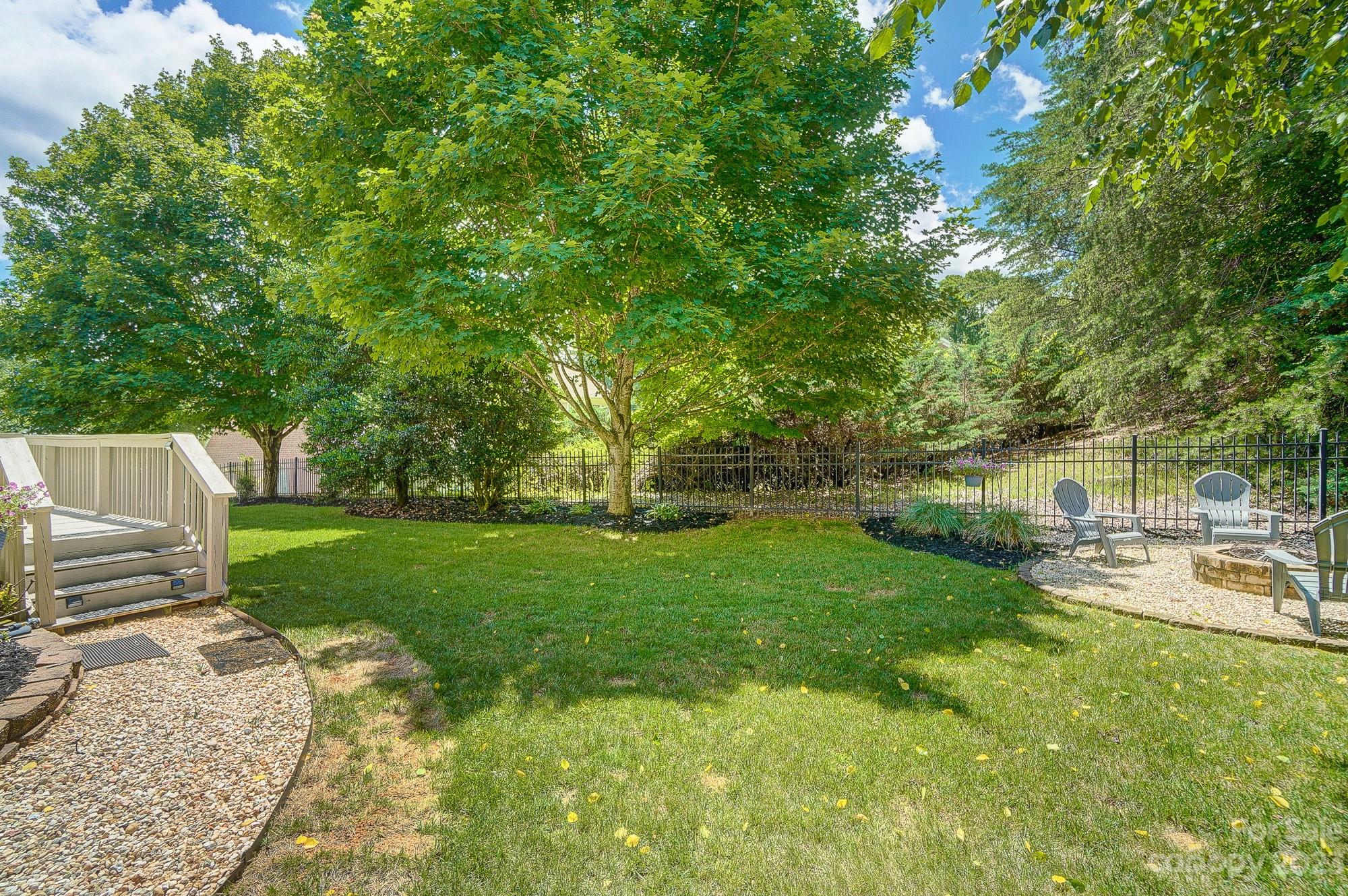 1105 Legacy Lane Fort Mill, SC 29708 - Photo 39 of 43 a view of yard with green space and trees around