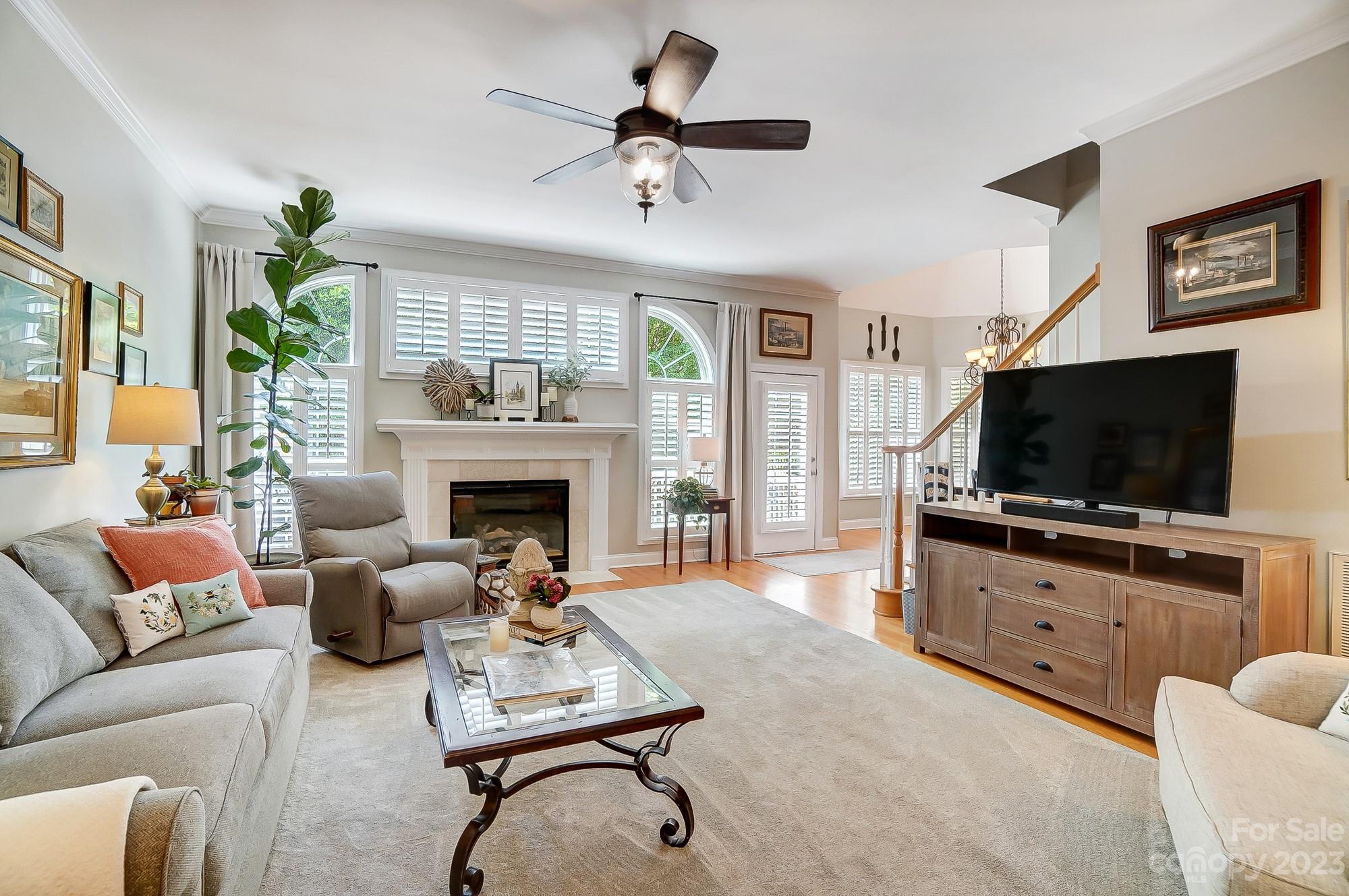1105 Legacy Lane Fort Mill, SC 29708 - Photo 6 of 43 a living room with furniture and a flat screen tv