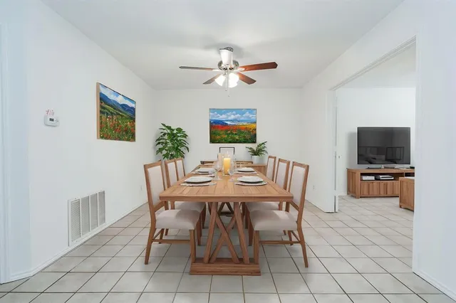 a view of a dining room with furniture
