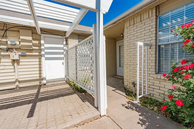 a view of a porch with a bench