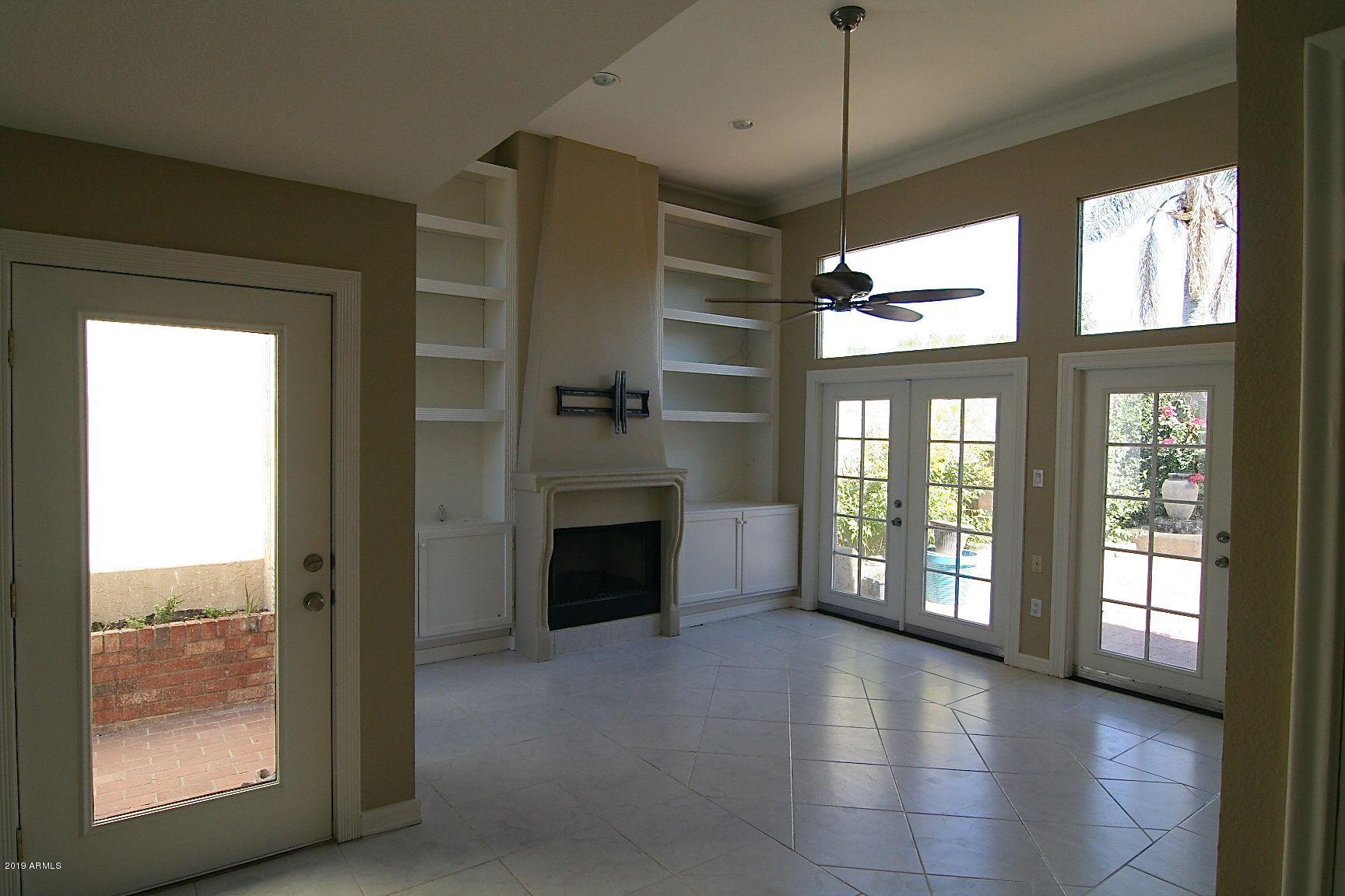 136 West Victoria Square Phoenix, AZ 85013 - Photo 1 of 15 a view of an empty room with a window