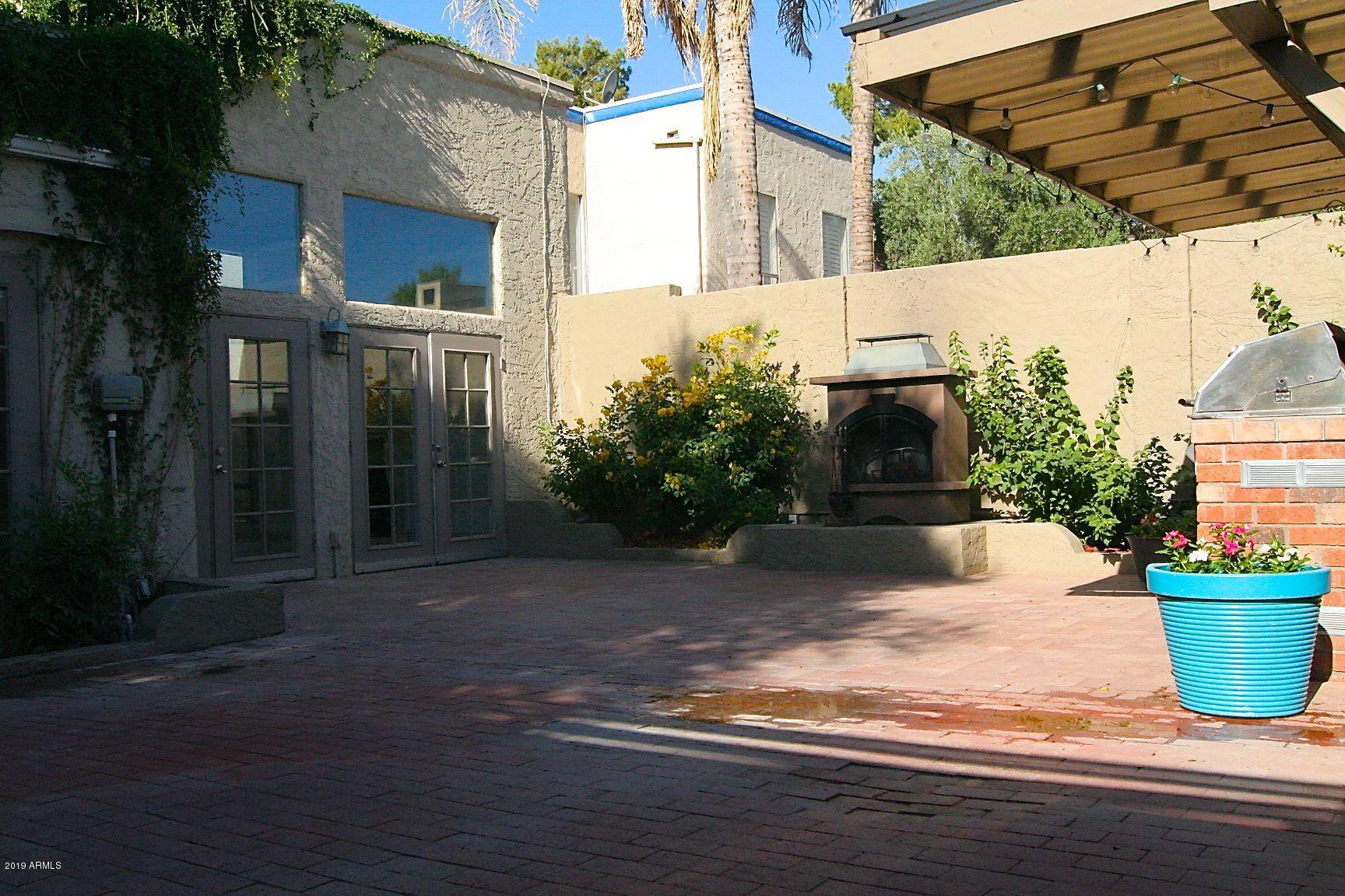 136 West Victoria Square Phoenix, AZ 85013 - Photo 11 of 15 a view of a house with backyard