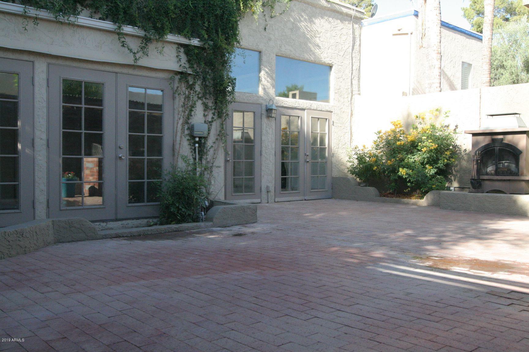 136 West Victoria Square Phoenix, AZ 85013 - Photo 12 of 15 a view of a entrance gate of the house