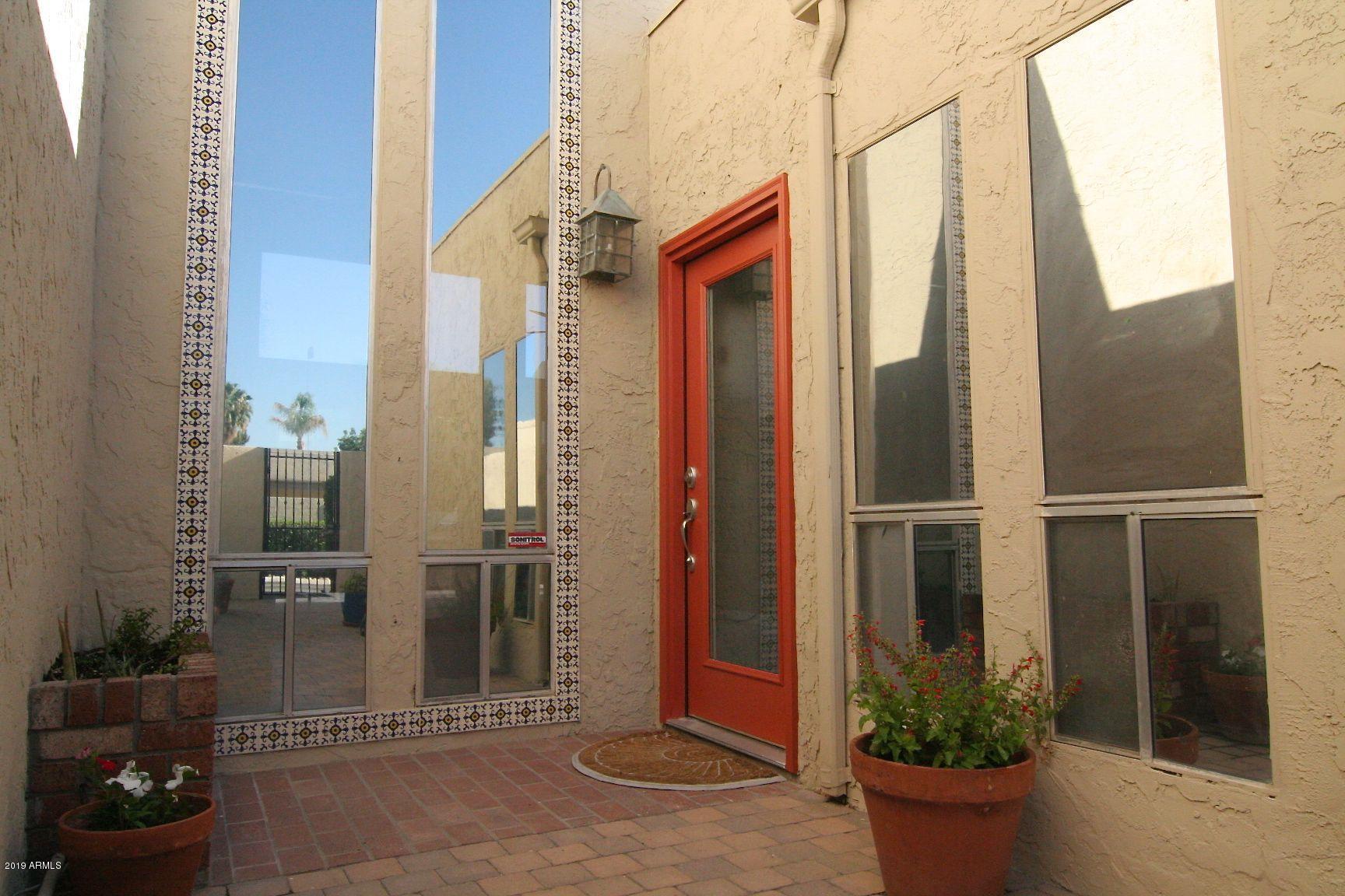 136 West Victoria Square Phoenix, AZ 85013 - Photo 13 of 15 a view of a potted plants next to a building