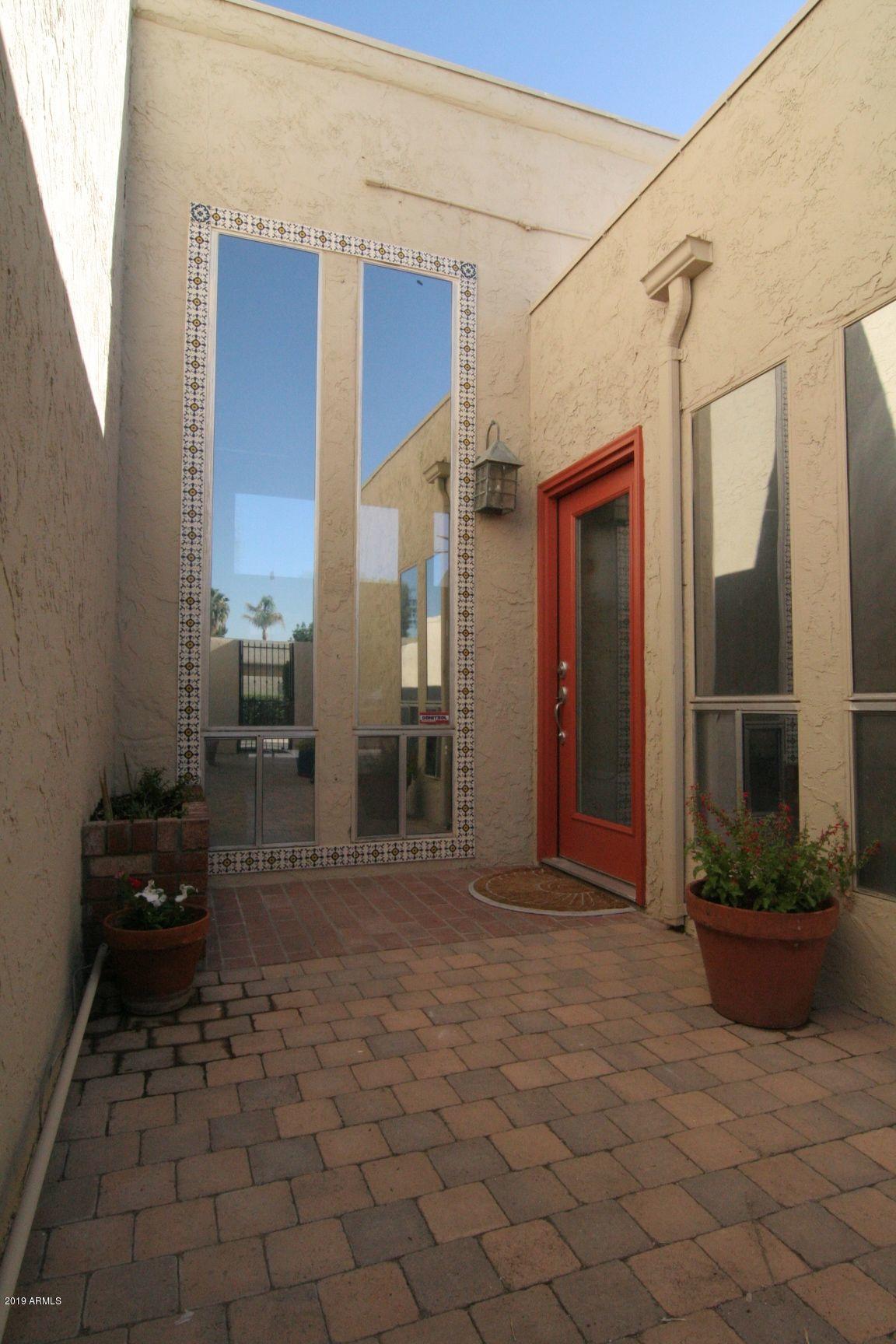 136 West Victoria Square Phoenix, AZ 85013 - Photo 14 of 15 a view of a house with a backyard