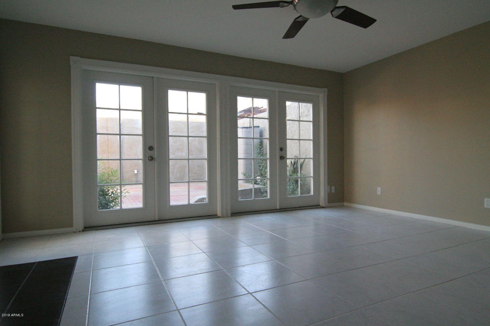 136 West Victoria Square Phoenix, AZ 85013 - Photo 6 of 15 a view of an empty room with a window