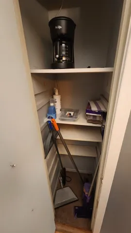 a stove top oven sitting inside of a kitchen
