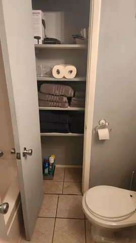 a front view of a house with a yard and porch