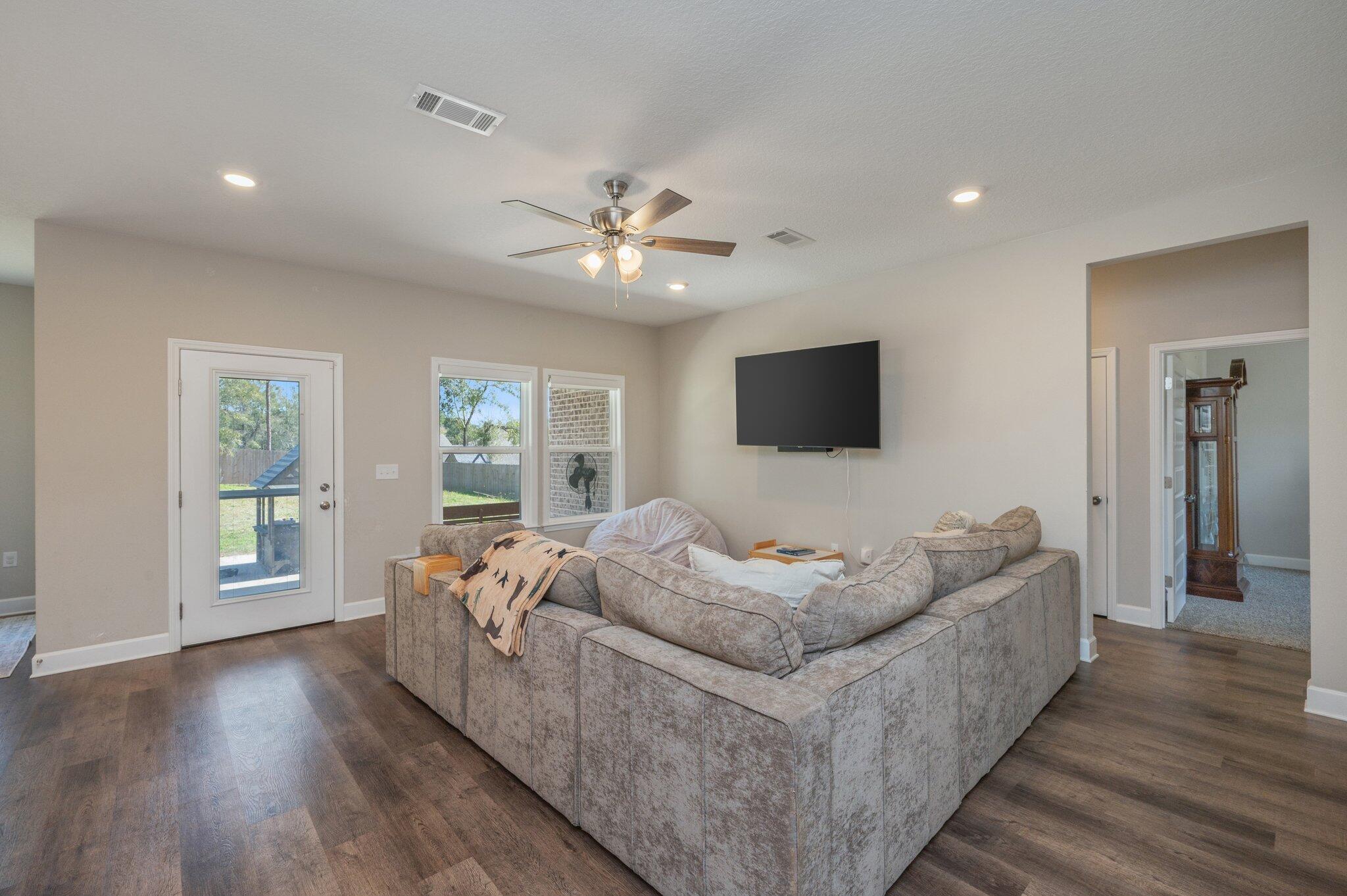5179 Rabbit Run Crestview, FL 32539 - Photo 2 of 30 a living room with furniture and a flat screen tv