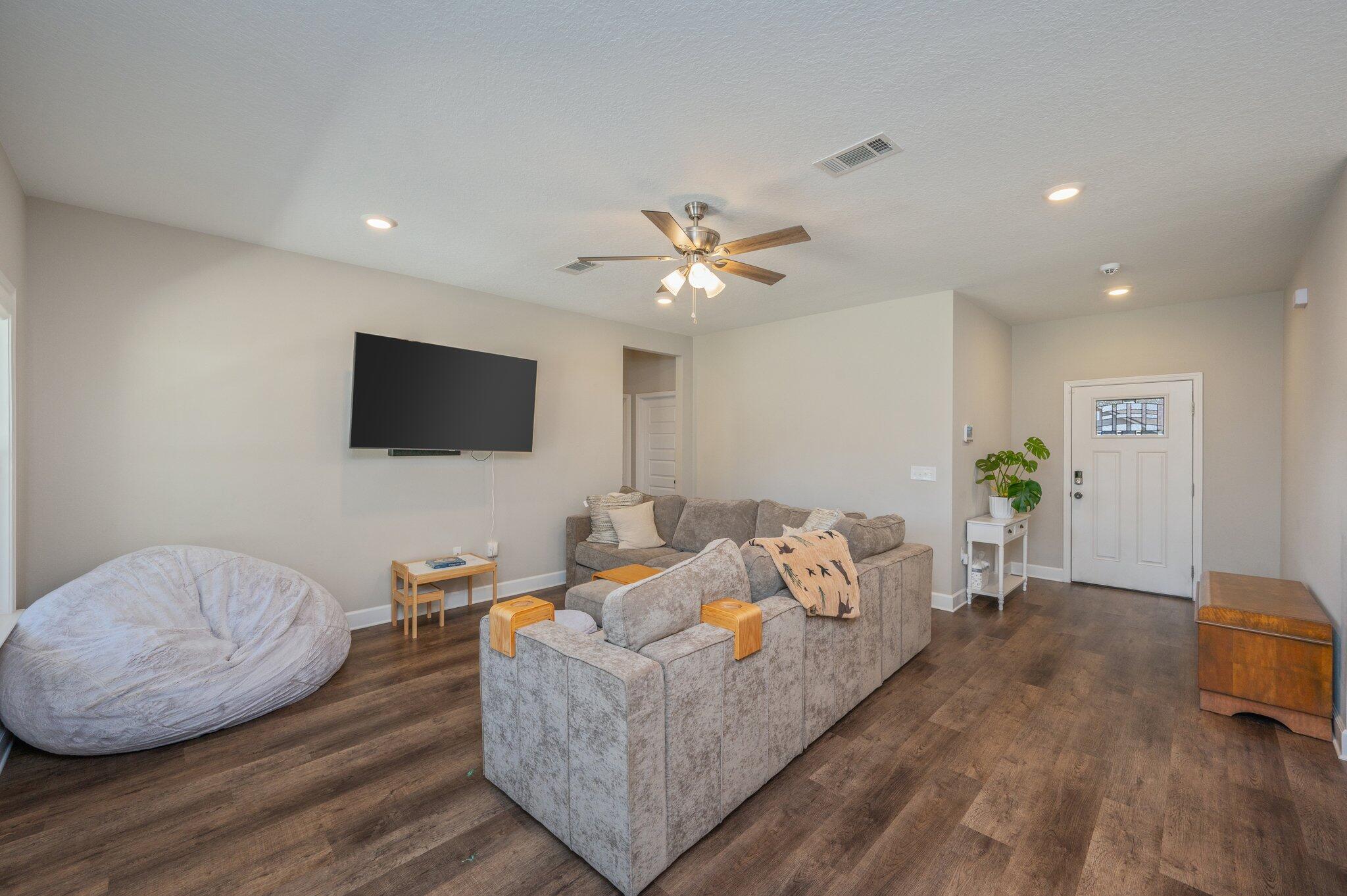 5179 Rabbit Run Crestview, FL 32539 - Photo 3 of 30 a living room with furniture and a flat screen tv