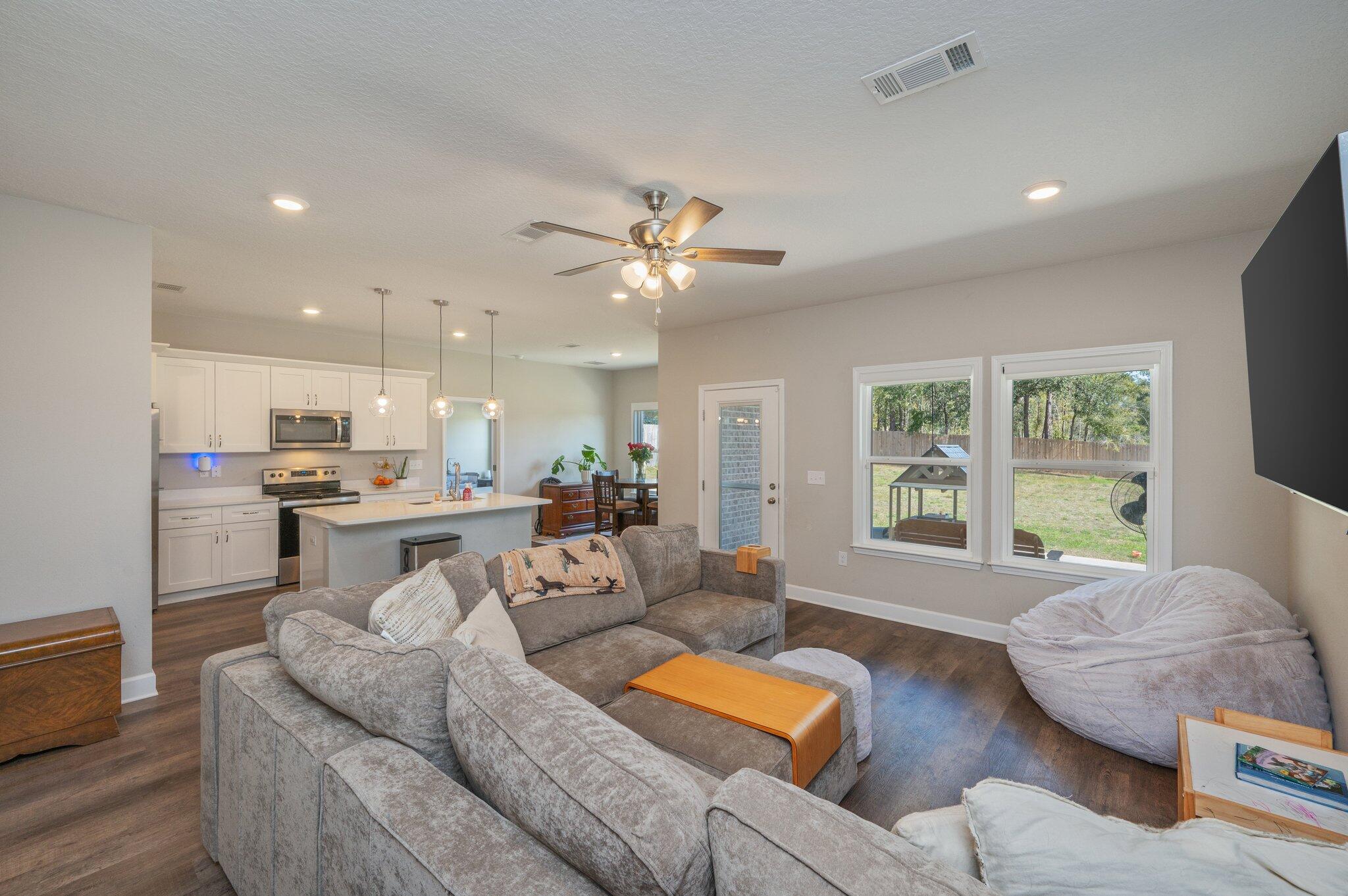 5179 Rabbit Run Crestview, FL 32539 - Photo 4 of 30 a living room with furniture and a large window