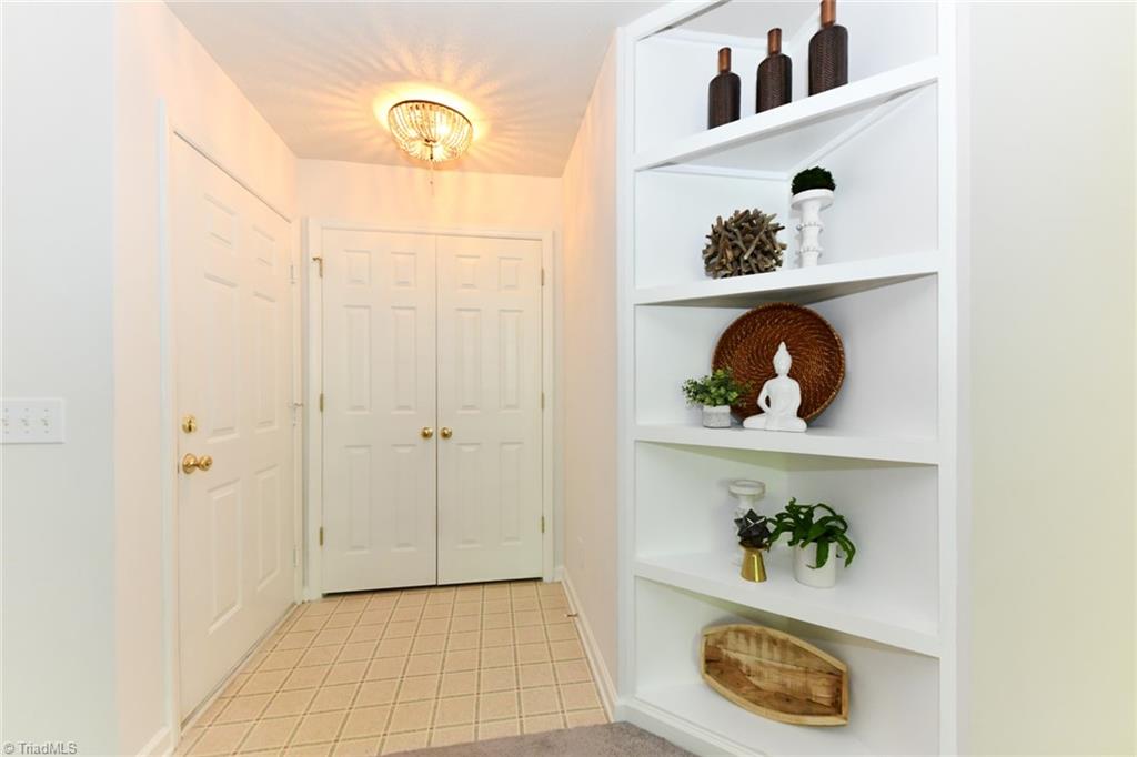 623 Timberline Ridge Lane Winston-Salem, NC 27106 - Photo 4 of 25 Spacious foyer area with large entry closet.
