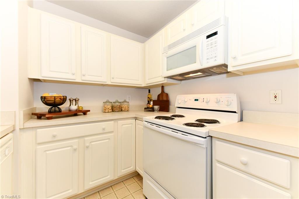 623 Timberline Ridge Lane Winston-Salem, NC 27106 - Photo 8 of 25 Built in lazysusan in lower corner cabinet with of cabinets and drawers for kitchen