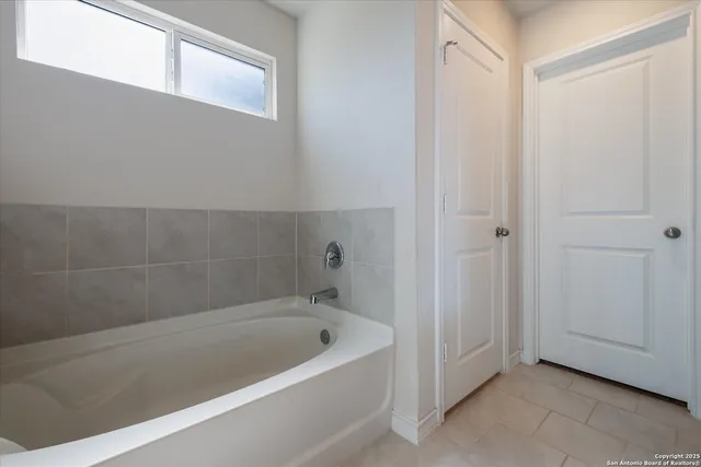 a bathroom with a bathtub