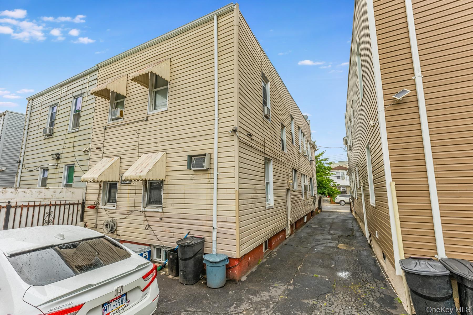 37-33 100th Street Queens, NY 11368 - Photo 14 of 14 View of side of property