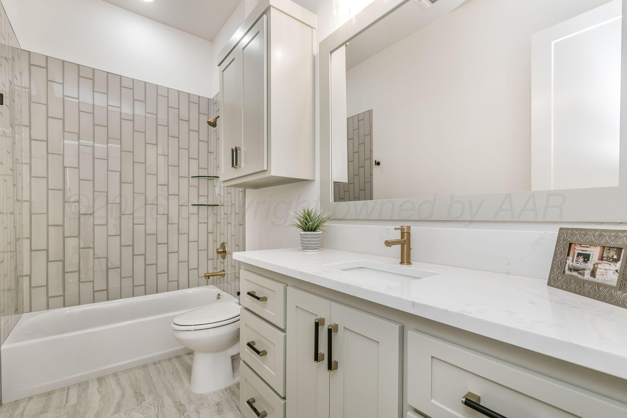 5806 Wesley Road Amarillo, TX 79119 - Photo 20 of 28 5806 Wesley Rd downstairs bathroom
