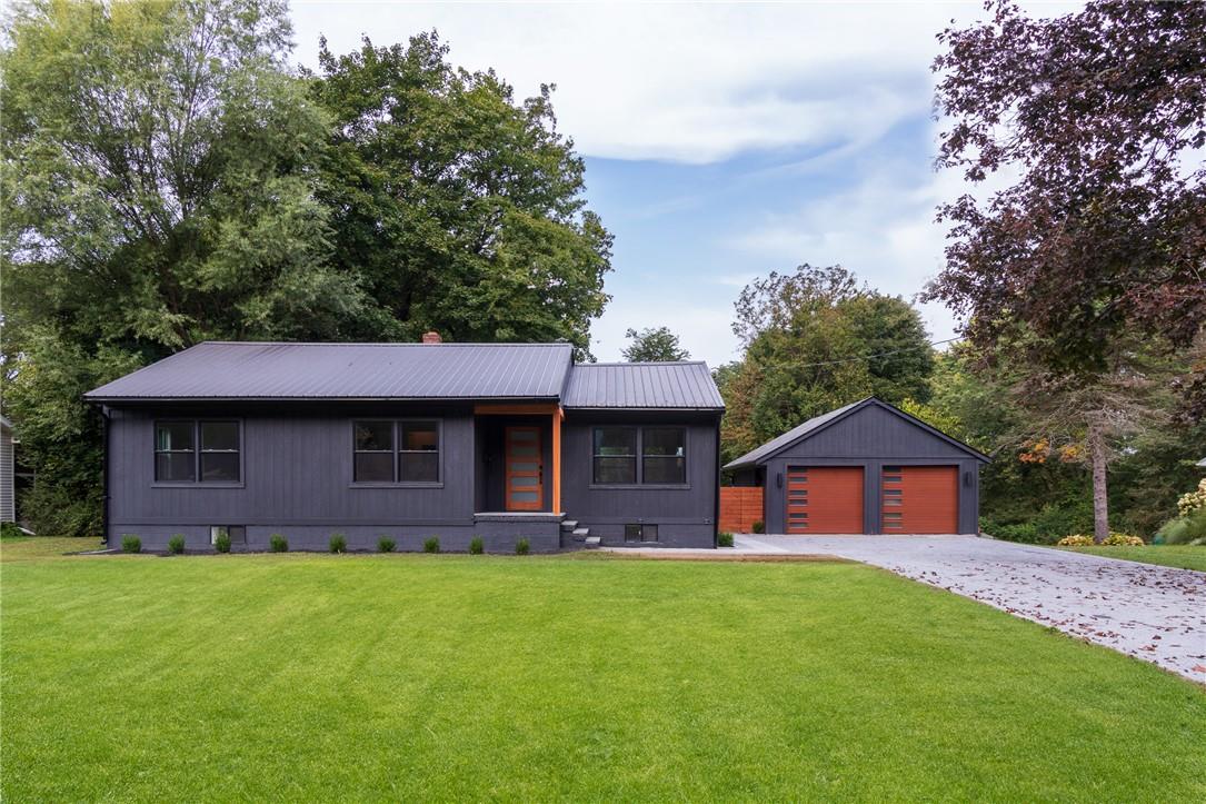 38 Benner Road Red Hook, NY 12571 - Photo 1 of 1 View of front facade with a front lawn. House and garage.