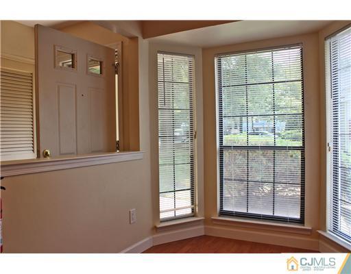 2001 Timber Oaks Road Edison, NJ 08820 - Photo 13 of 25 a view of an empty room with a window