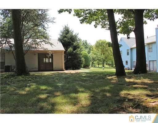 2001 Timber Oaks Road Edison, NJ 08820 - Photo 23 of 25 a view of a yard with plants and trees