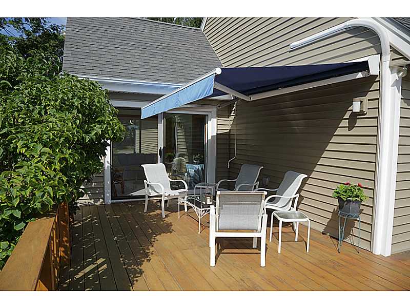816 East Shore Road Jamestown, RI 02835 - Photo 15 of 24 Patio/Deck. The awning makes a cozy spot to chat and have coffee!