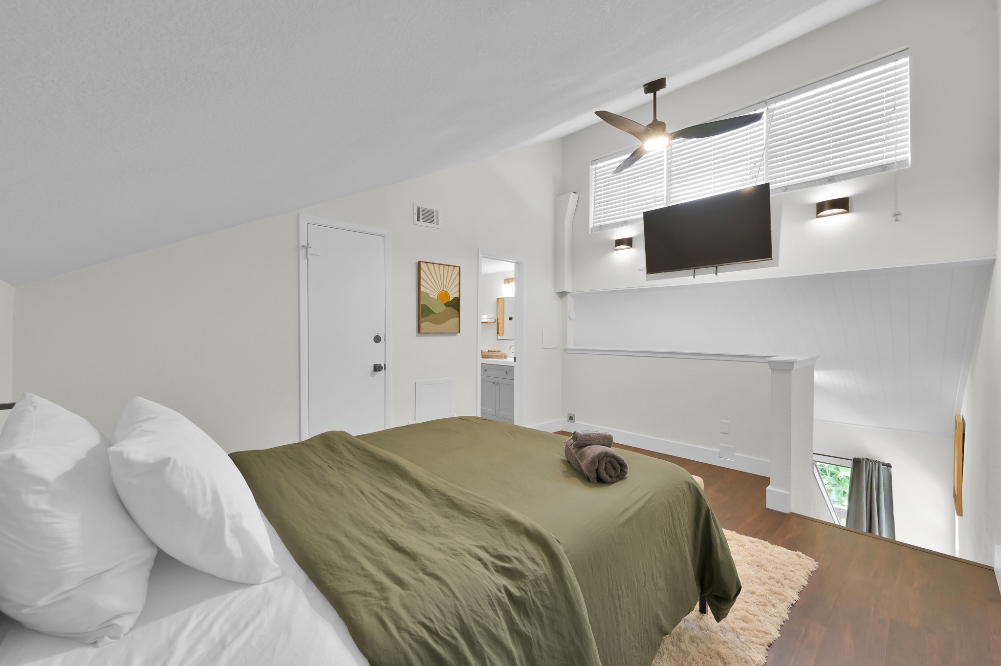 12900 Walden Road, Unit 506E Montgomery, TX 77356 - Photo 13 of 31 a bedroom with a bed and a television