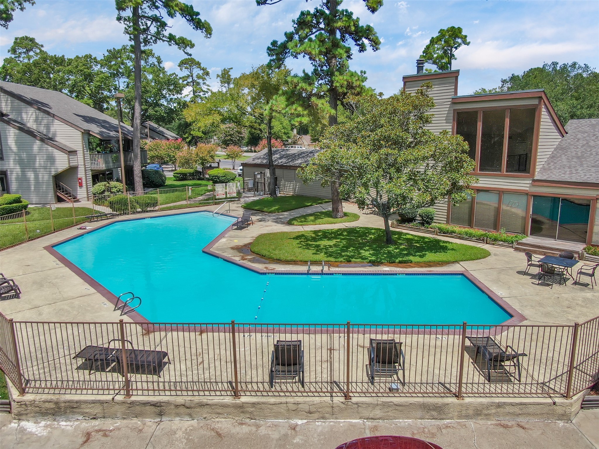 12900 Walden Road, Unit 506E Montgomery, TX 77356 - Photo 20 of 31 a view of a house with backyard