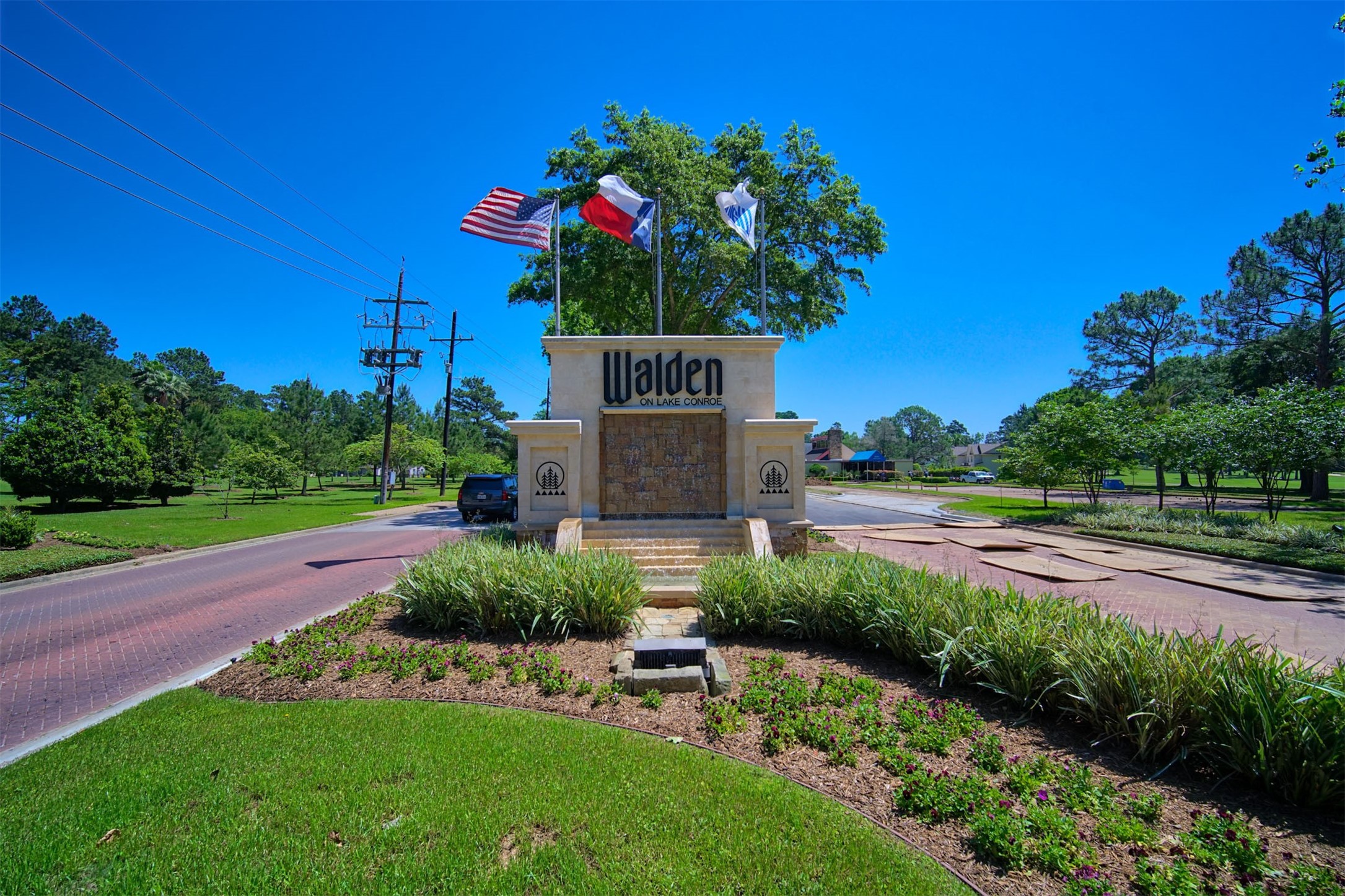 12900 Walden Road, Unit 506E Montgomery, TX 77356 - Photo 25 of 31 a front view of a house with a yard