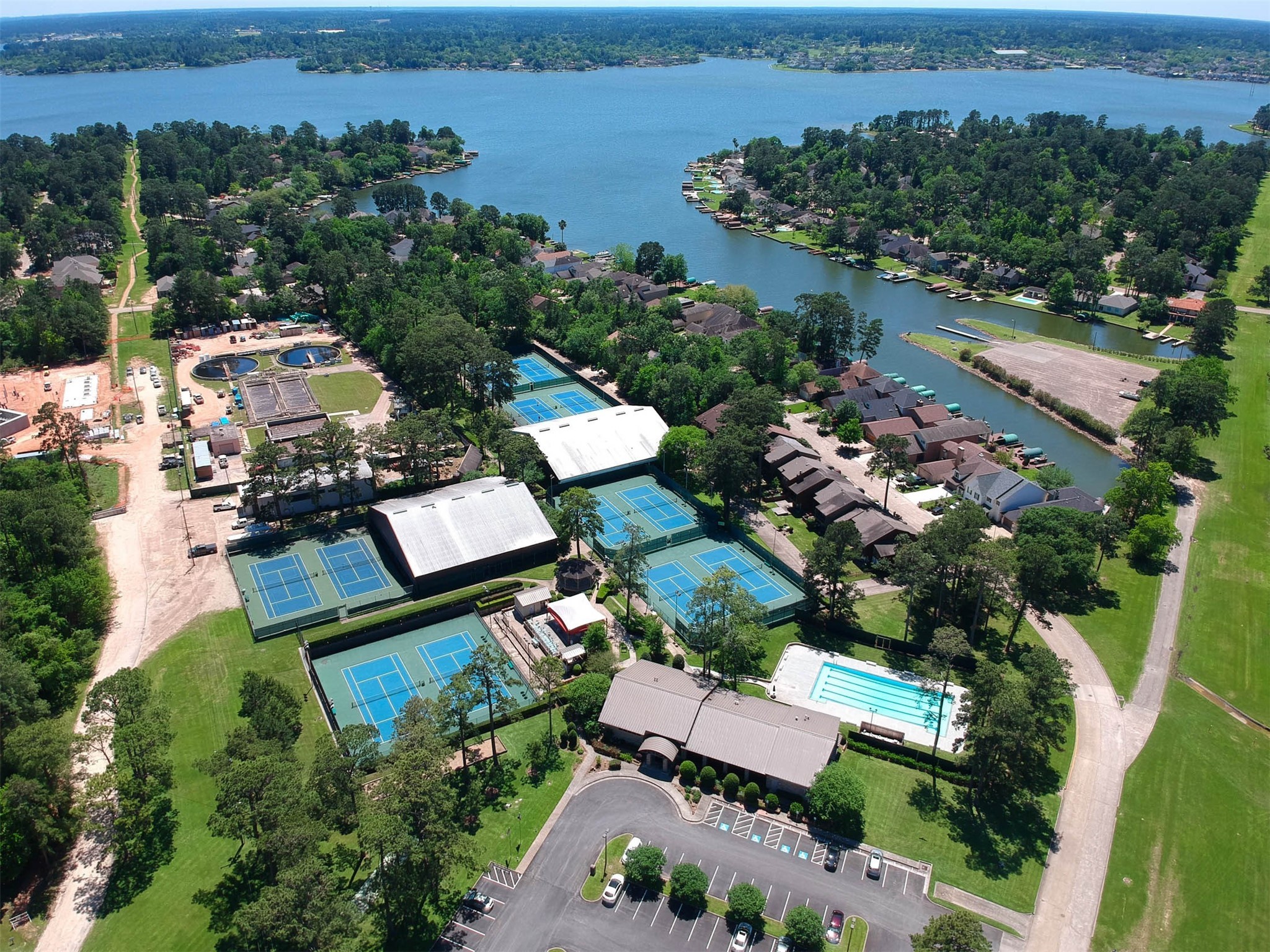 12900 Walden Road, Unit 506E Montgomery, TX 77356 - Photo 27 of 31 an aerial view of multiple houses with yard
