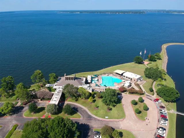 a view of a lake with a yard