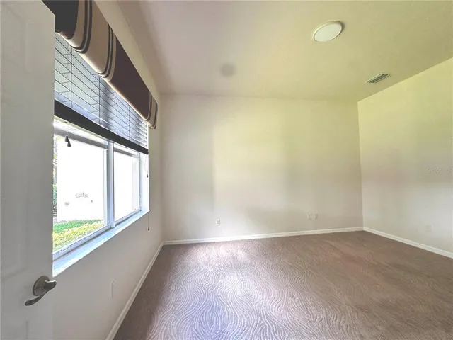 a bathroom with a sink double vanity and shower