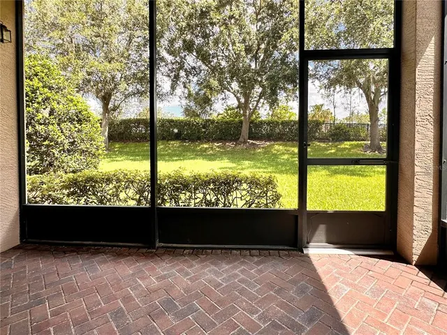 a view of balcony with yard