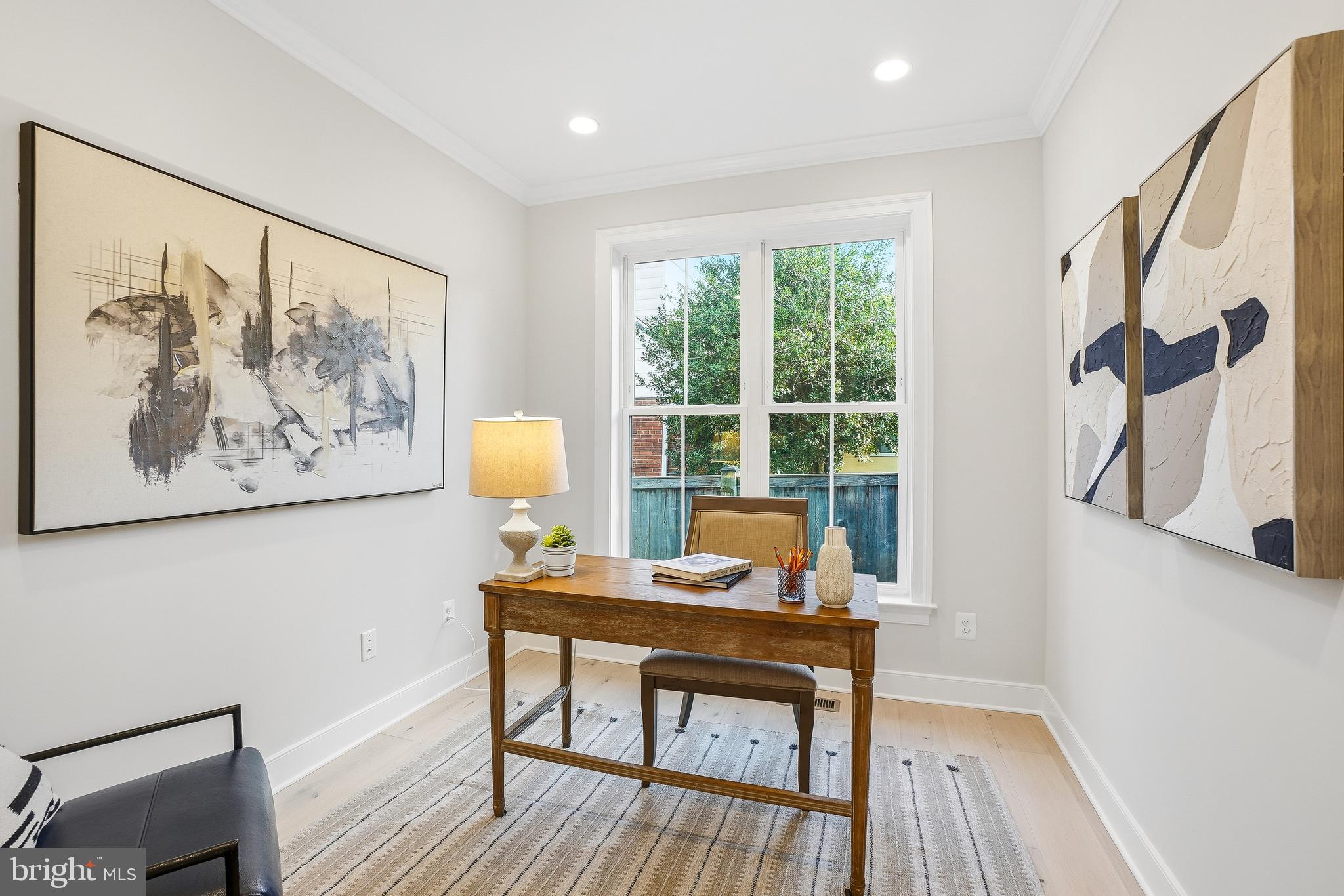 8802 Ridge Road Bethesda, MD 20817 - Photo 15 of 26 a view of a workspace with furniture and a window