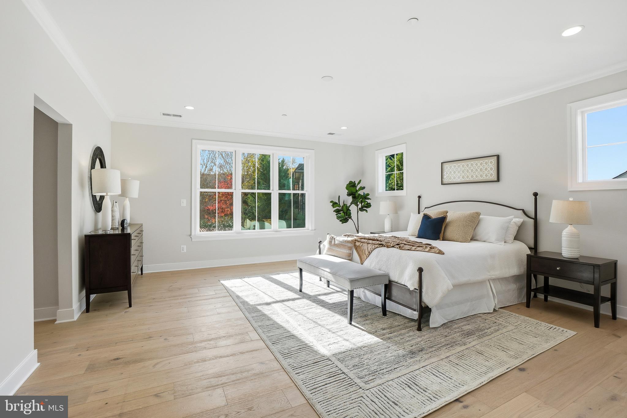 8802 Ridge Road Bethesda, MD 20817 - Photo 17 of 26 a bed room with a bed and a window