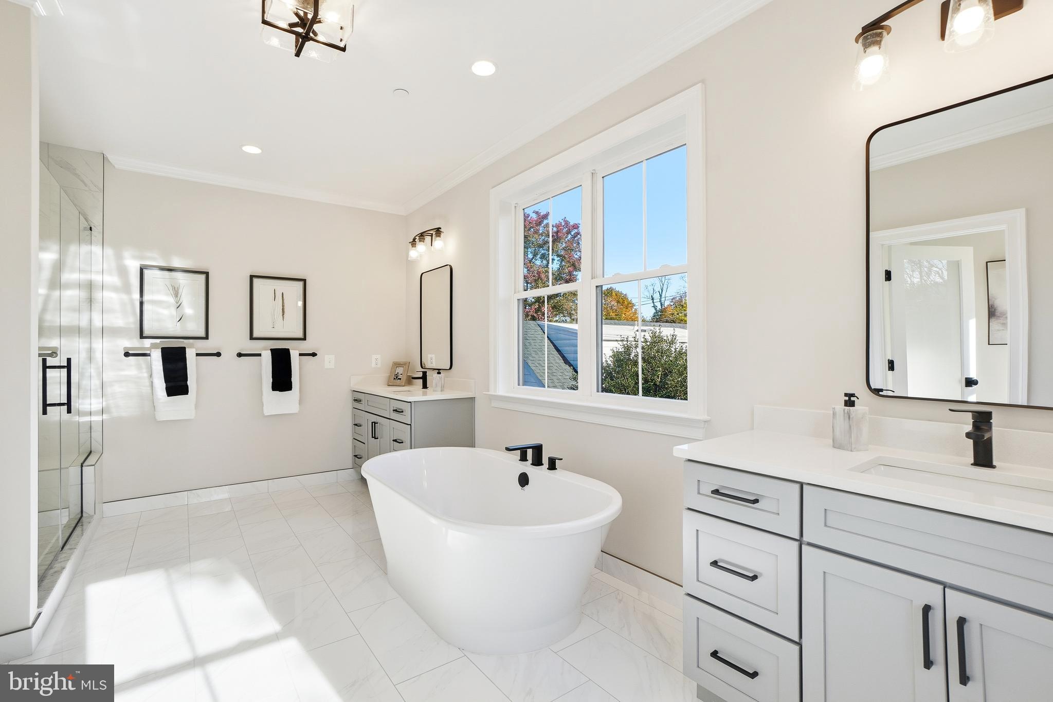 8802 Ridge Road Bethesda, MD 20817 - Photo 23 of 26 a bathroom with a bathtub sink and mirror