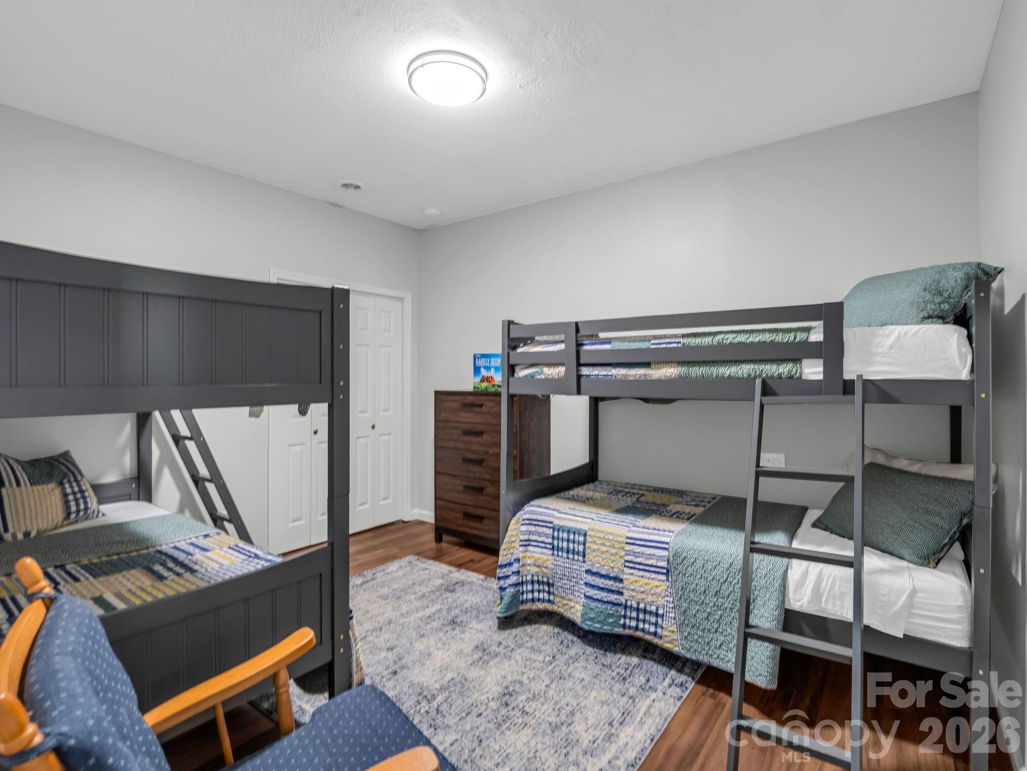 656 Cashiers Valley Road Brevard, NC 28712 - Photo 25 of 37 a room with furniture a air conditioner vent and a rug