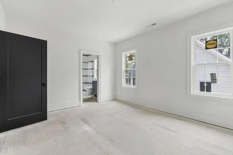 an empty room with windows