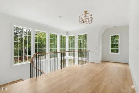 a view of empty room with windows