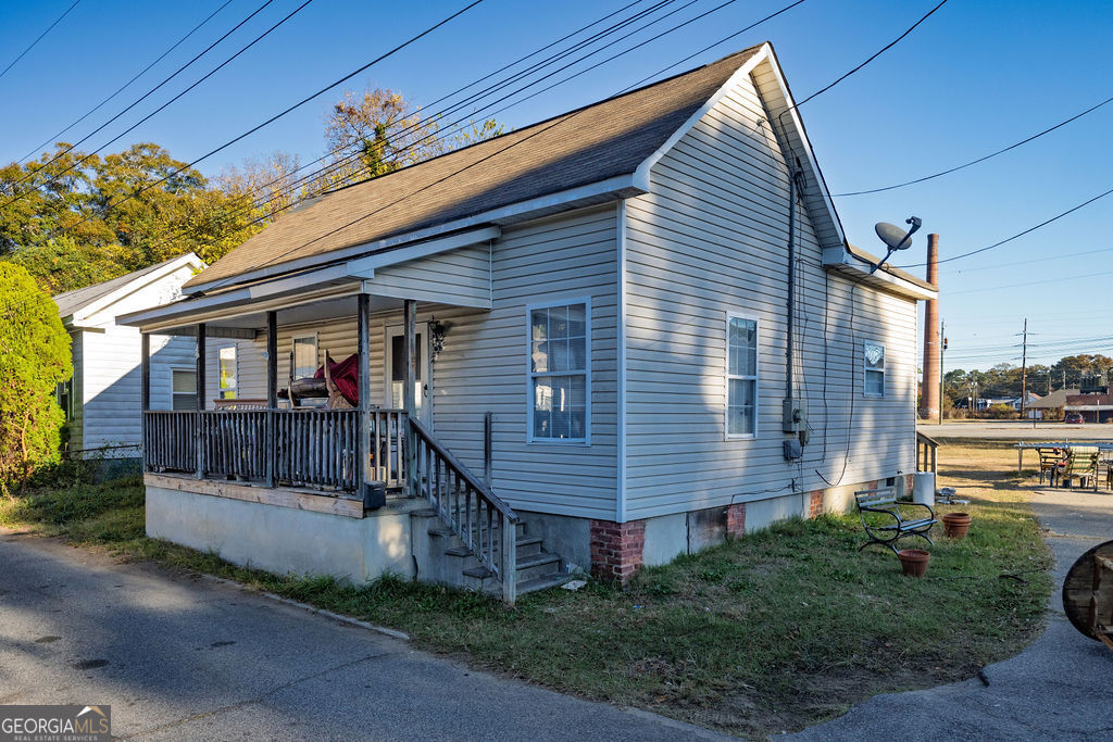 75 Short Street Macon, GA 31204 - Photo 2 of 23 a view of house with a yard and potted plants
