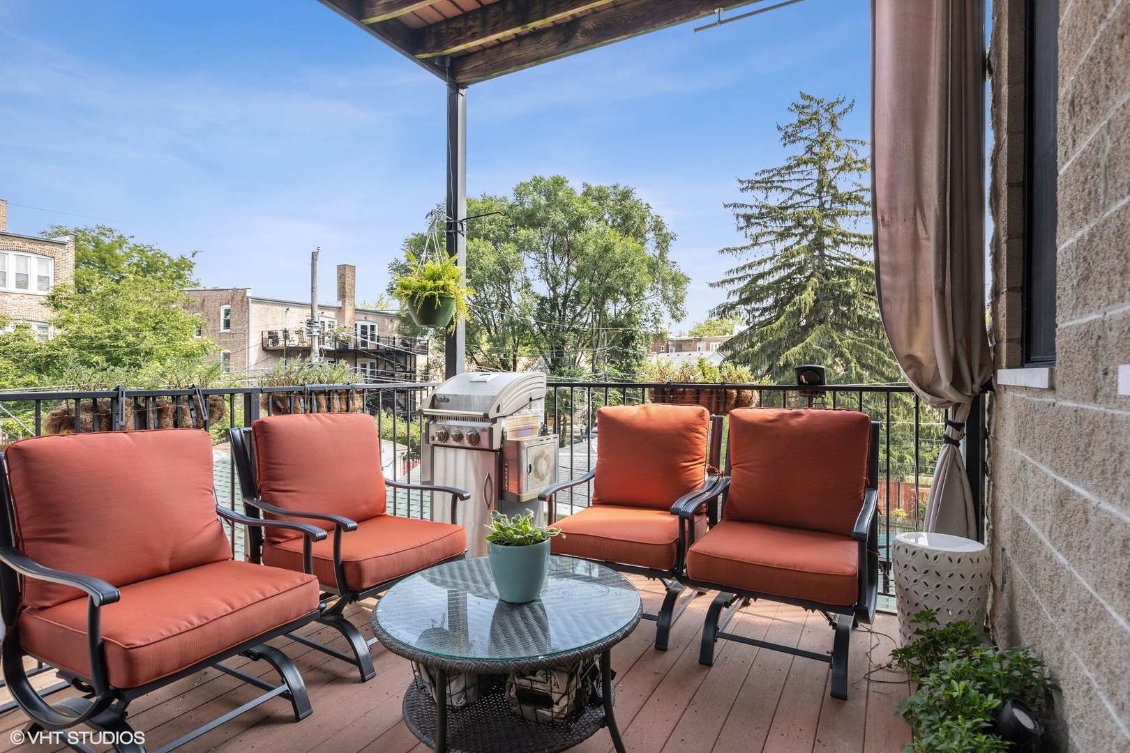 1512 West Victoria Street, Unit 2 Chicago, IL 60660 - Photo 18 of 19 a outdoor sitting area with furniture and a potted plant