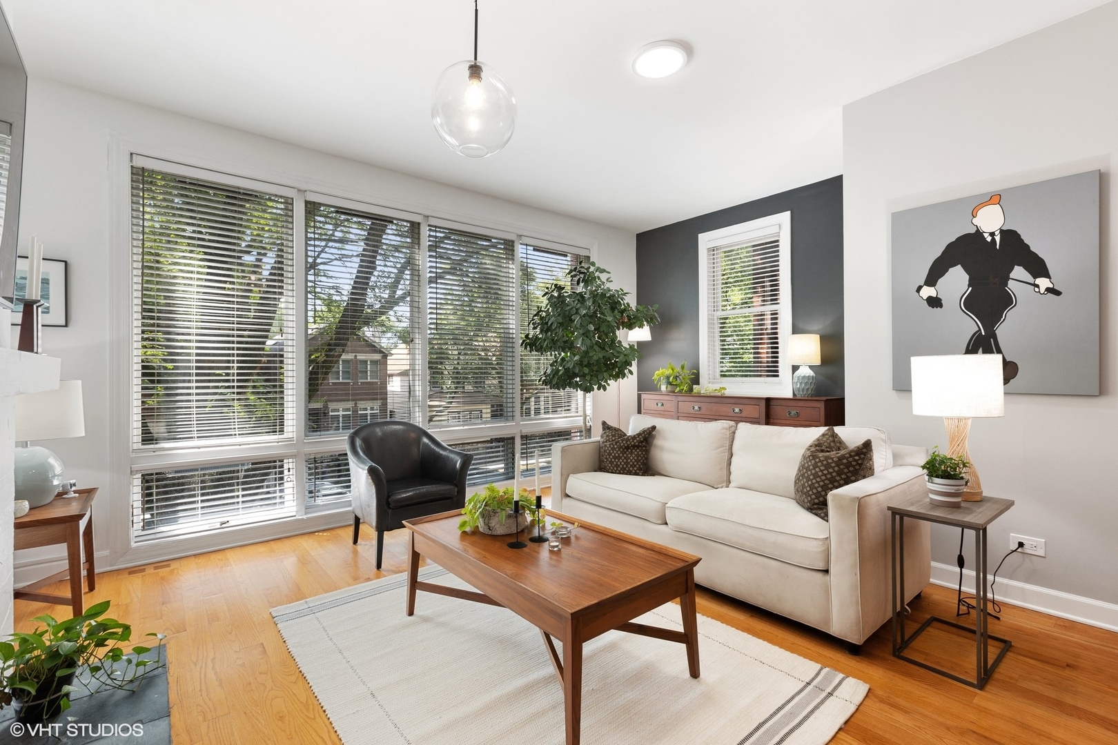 1512 West Victoria Street, Unit 2 Chicago, IL 60660 - Photo 3 of 19 a living room with furniture and a large window
