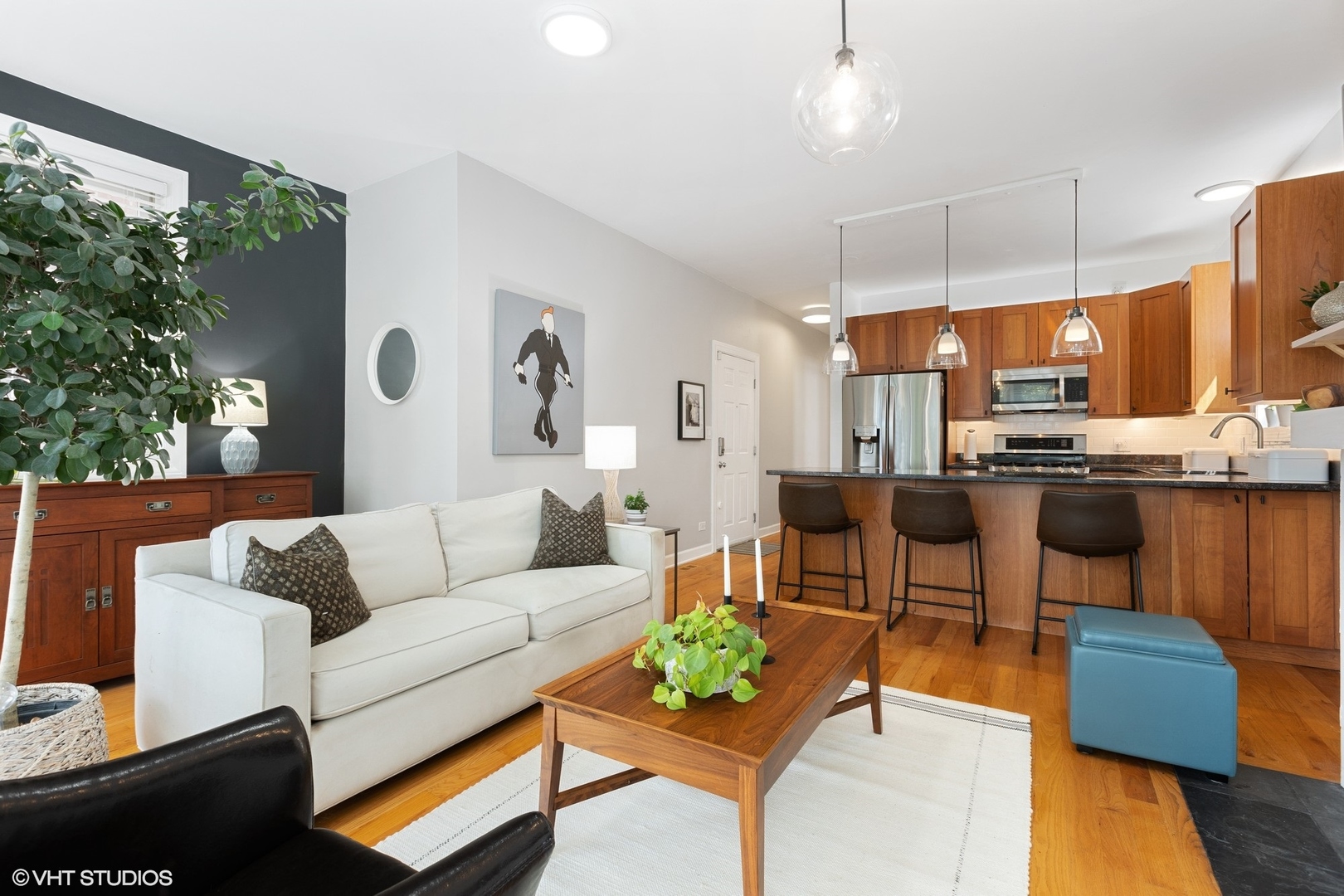 1512 West Victoria Street, Unit 2 Chicago, IL 60660 - Photo 5 of 19 a living room with furniture kitchen view and a large window