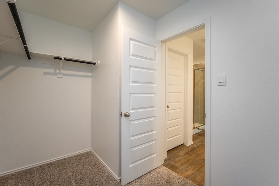 3726 Lanercost Lane Fulshear, TX 77441 - Photo 29 of 30 a view of walk in closet with empty racks