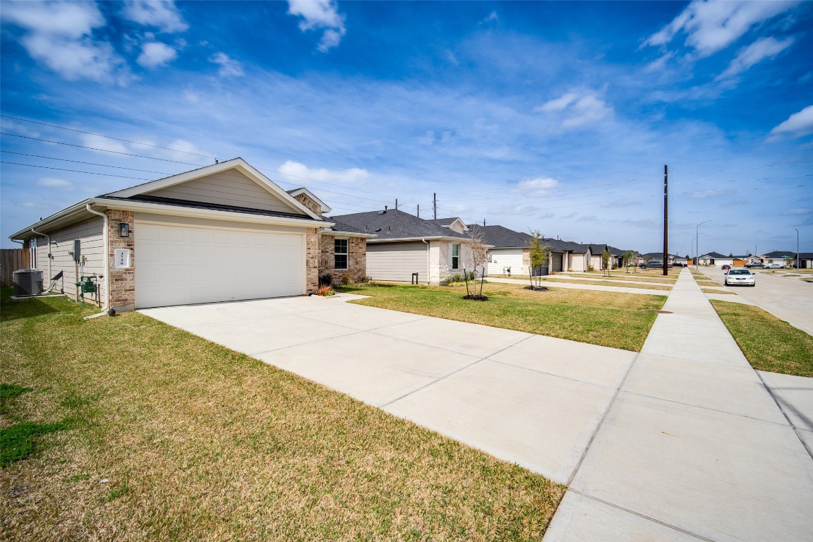 3726 Lanercost Lane Fulshear, TX 77441 - Photo 3 of 30 a house view with a outdoor space