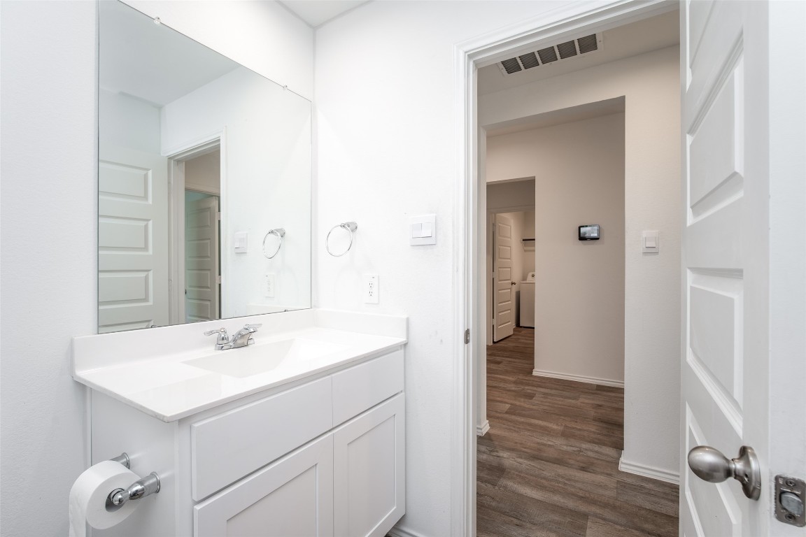 3726 Lanercost Lane Fulshear, TX 77441 - Photo 10 of 30 a bathroom with a sink mirror and vanity