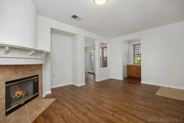 a view of wooden floor in an empty room