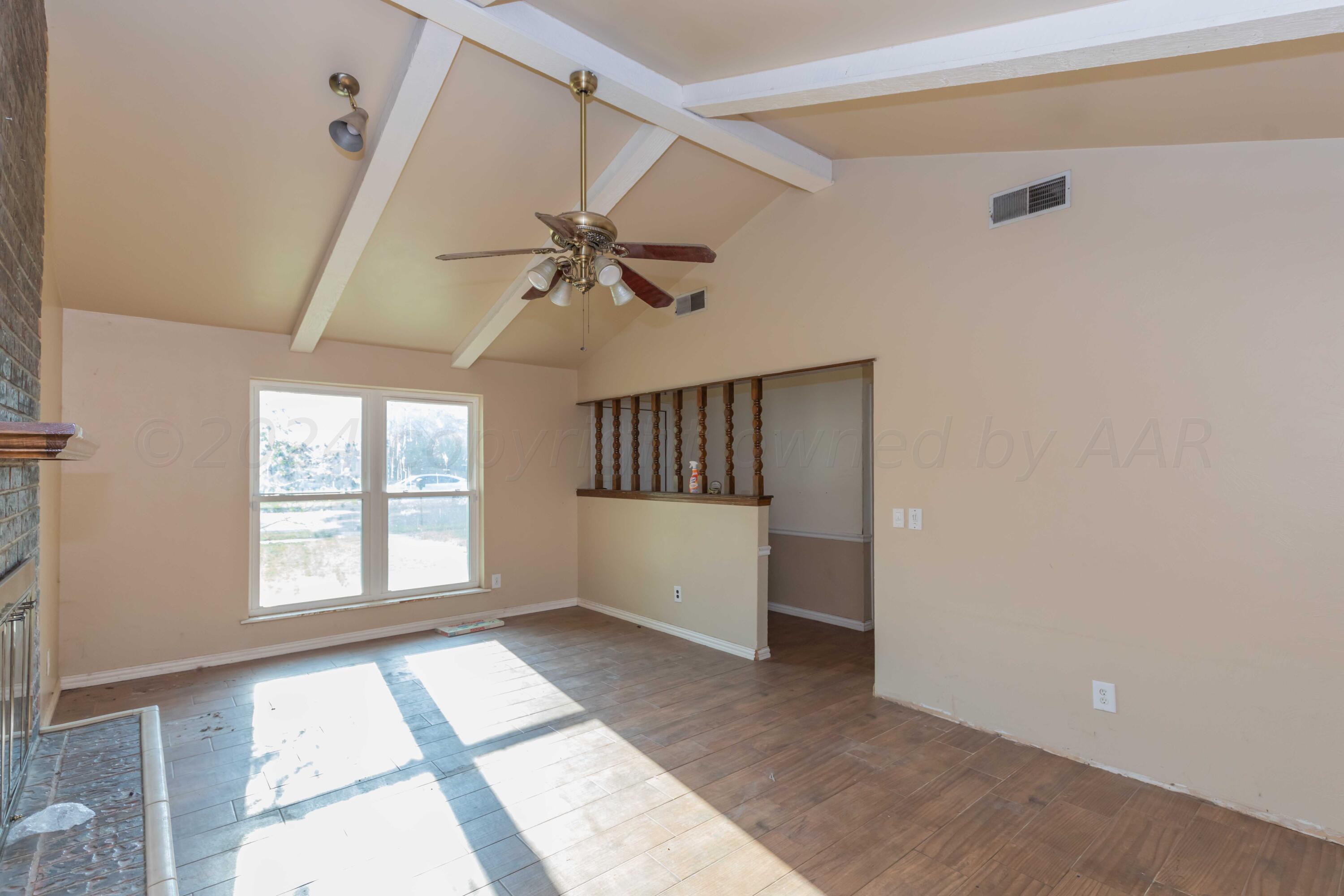 5304 Leigh Avenue Amarillo, TX 79110 - Photo 24 of 36 a view of an empty room with a window