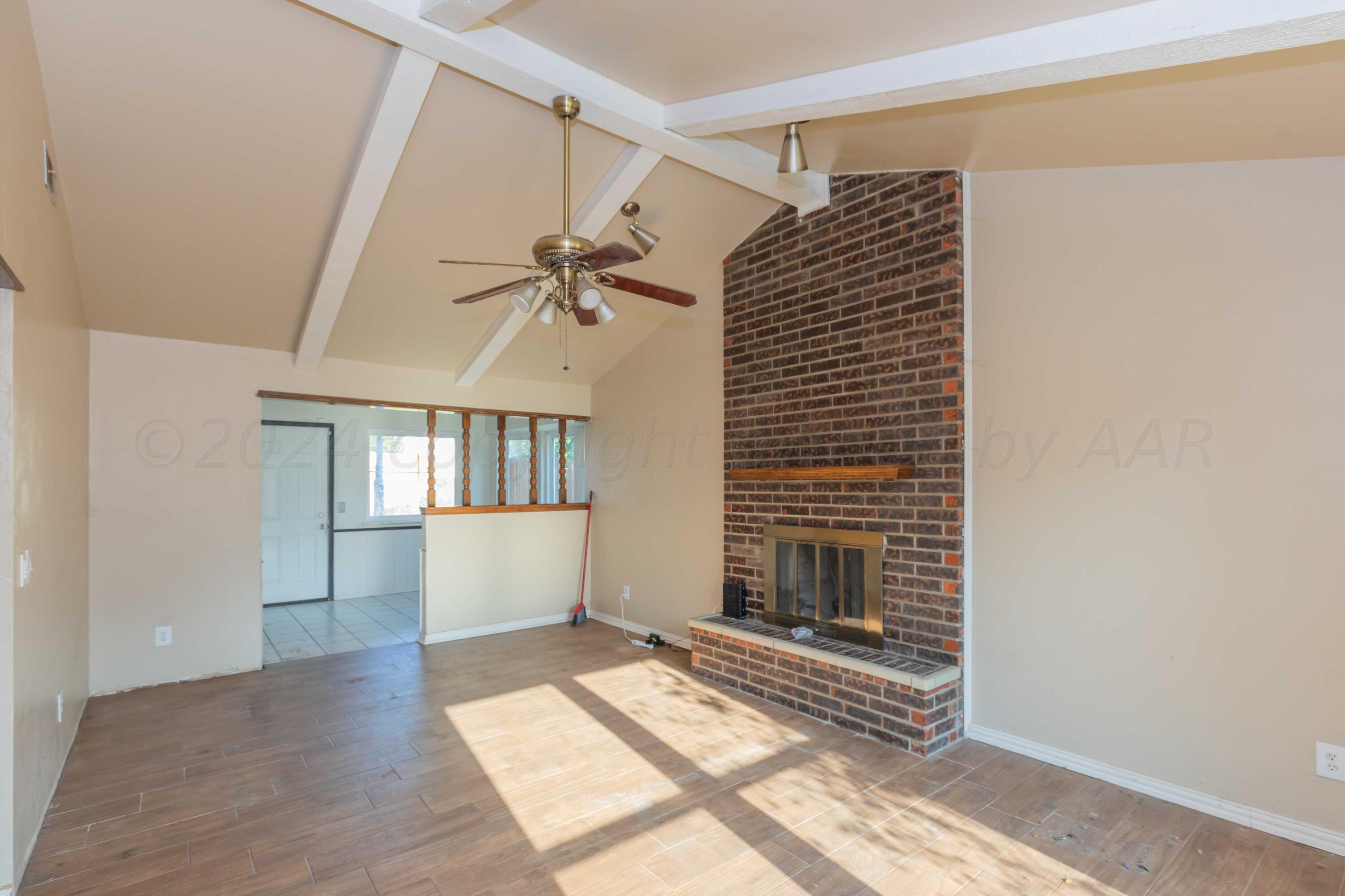 5304 Leigh Avenue Amarillo, TX 79110 - Photo 25 of 36 a view of an empty room with a window