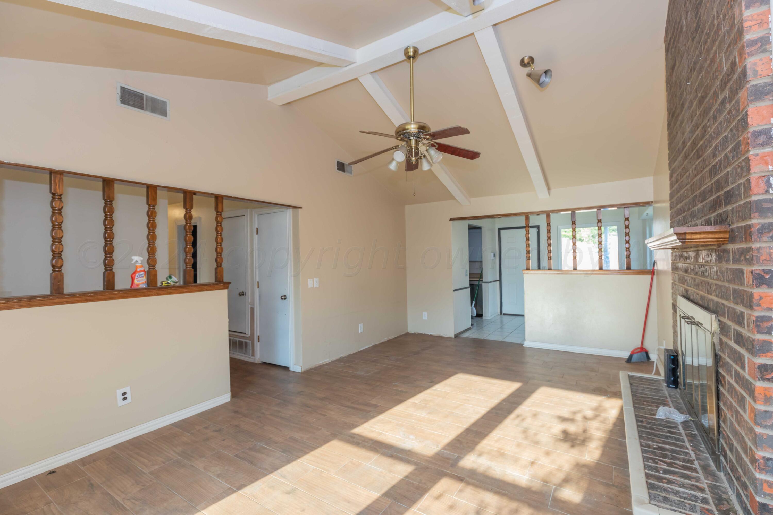 5304 Leigh Avenue Amarillo, TX 79110 - Photo 26 of 36 a view of an empty room with a window